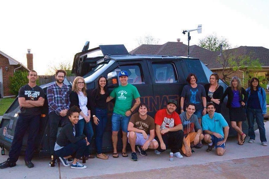 Tour guests in front of the Dominator